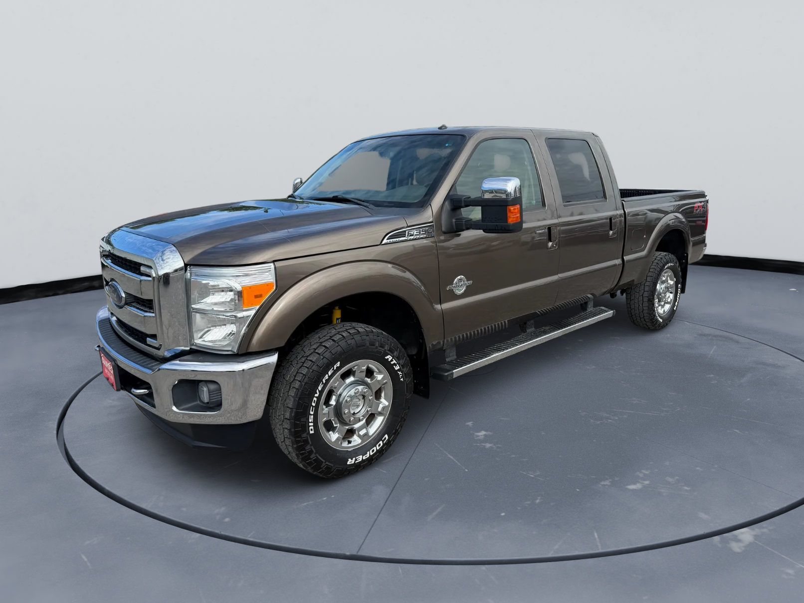 2015 Ford Super Duty F-350 SRW Lariat in Brown — front three-quarter view