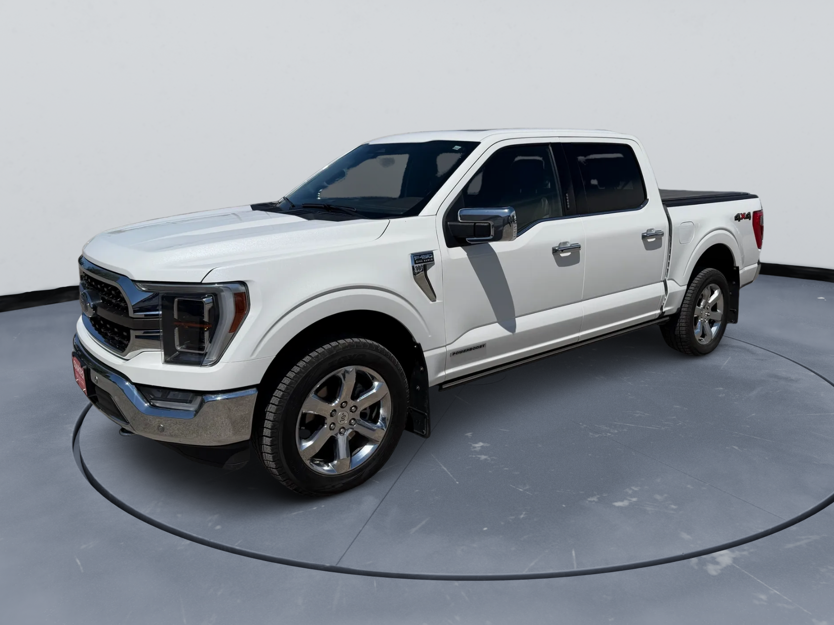 2023 Ford F-150 King Ranch in White — front three-quarter view