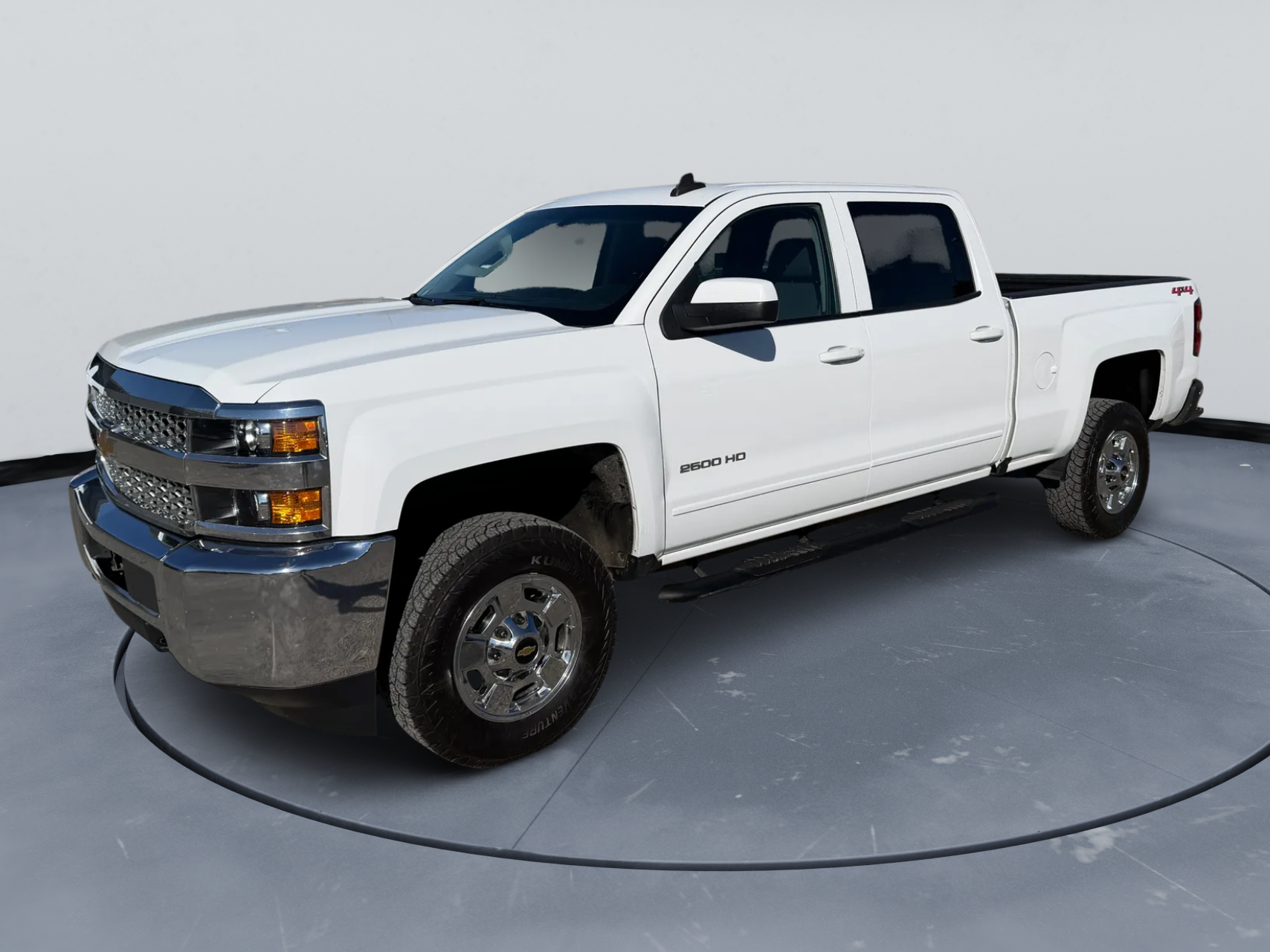 2019 Chevrolet Silverado 2500HD LT in White — front three-quarter view