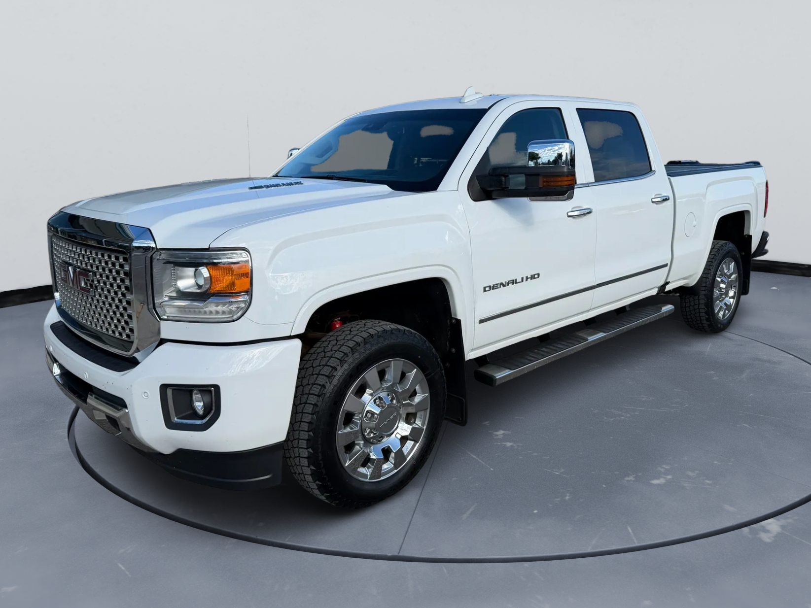 2016 GMC Sierra 2500HD Denali in White — front three-quarter view