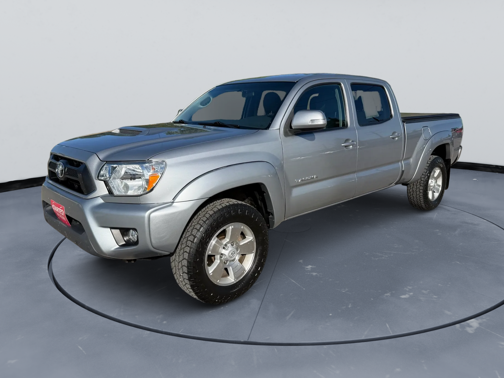 2015 Toyota Tacoma TRD Sport in Silver — front three-quarter view